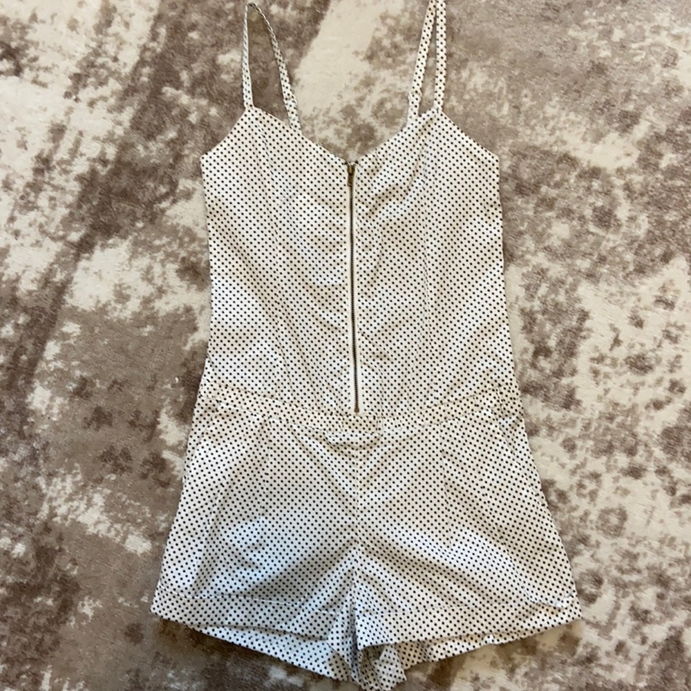 White romper with black polka dots